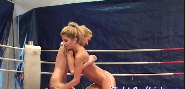  Lotioned babes wrestling in a boxing ring